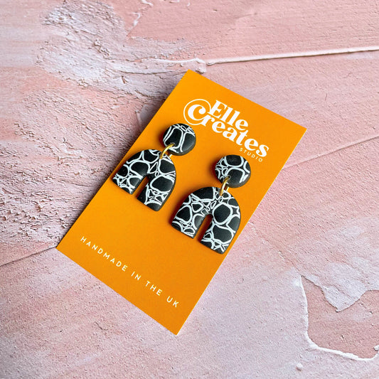 SMALL BLACK & WHITE PATTERNED ARCH STATEMENT EARRINGS
