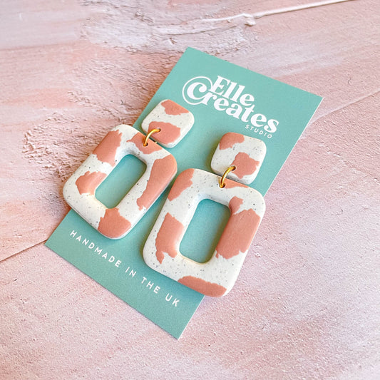 PINK COW PRINT STATEMENT EARRINGS