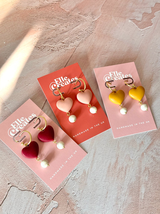 MUSTARD PUFFY HEART & CLAY PEARL STATEMENT HOOP EARRINGS