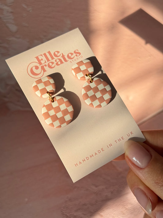 BLUSH CHECKERED CIRCLE DROP STATEMENT EARRINGS