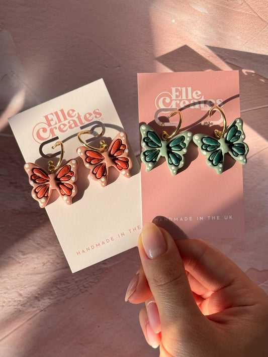 BLUSH BUTTERFLY HOOP EARRINGS