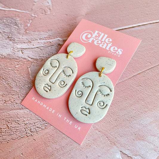 LARGE SPECKLED WHITE BLUSHING FACE STATEMENT EARRINGS