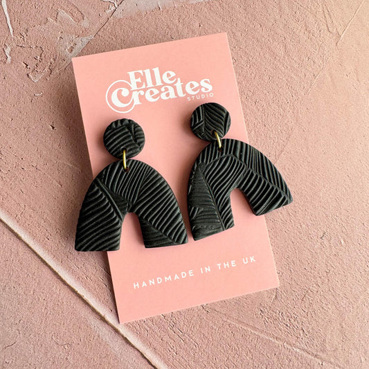 BLACK TEXTURED JUNGLE ARCH STATEMENT EARRINGS