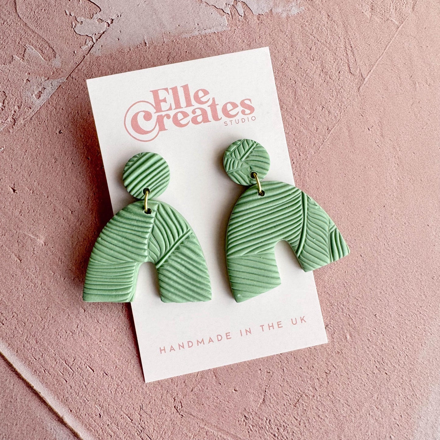 GREEN TEXTURED JUNGLE ARCH STATEMENT EARRINGS