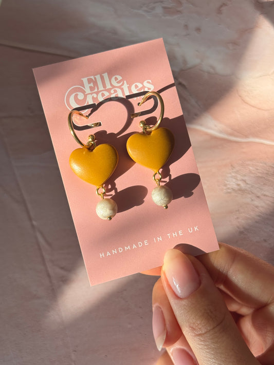 MUSTARD PUFFY HEART & CLAY PEARL STATEMENT HOOP EARRINGS