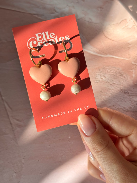 BLUSH PUFFY HEART & CLAY PEARL STATEMENT HOOP EARRINGS