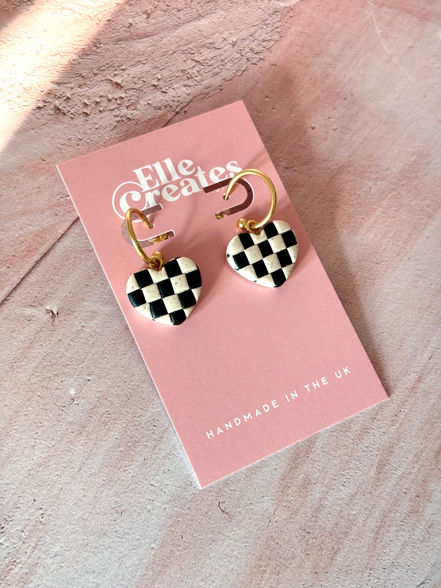 CHECKERED HEART HOOP STATEMENT EARRINGS