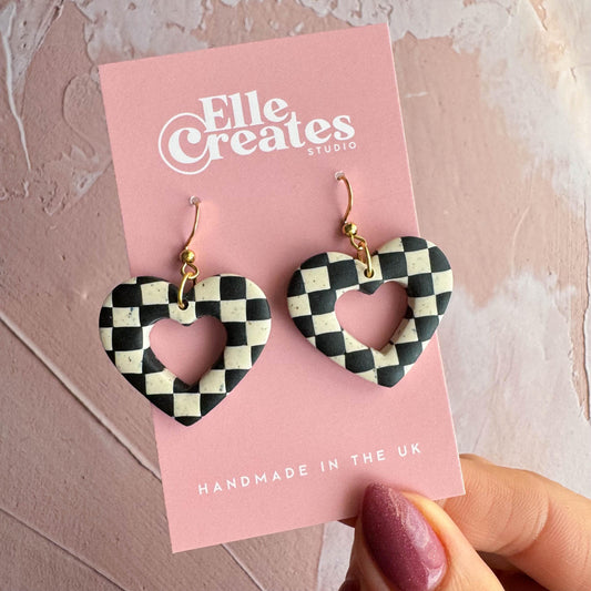 SPECKLED CREAM & BLACK HEART DONUT STATEMENT EARRINGS